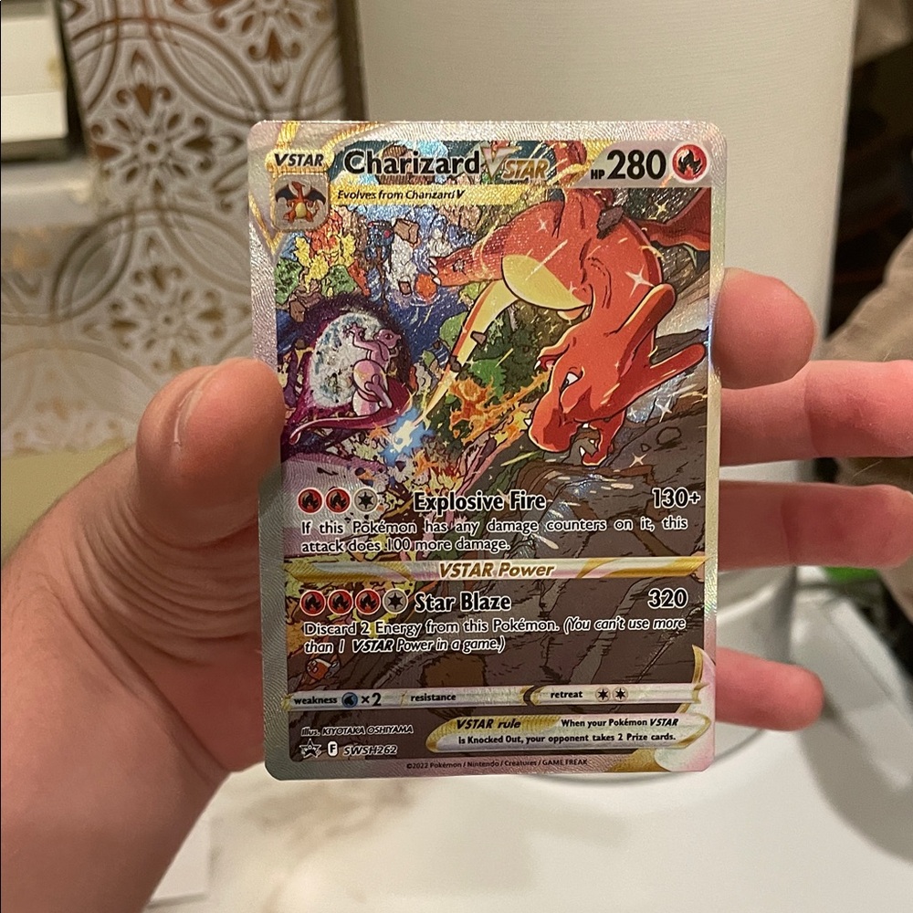 Pokemon Charizard VSTAR Trading Card - Red and Gold